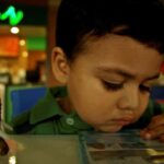 webfoto de alex lanz nino leyendo